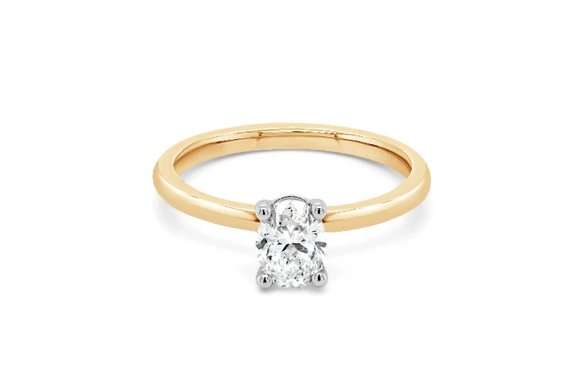 dainty chain bracelet layered .73CT Oval Diamond Engagement Ring: Yellow Gold