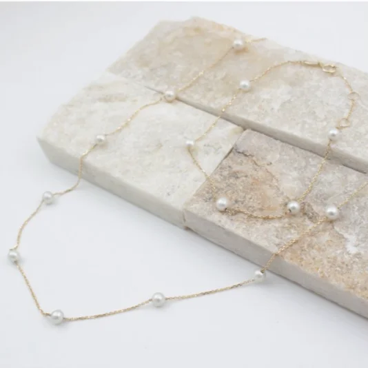 dainty gold chain earrings 10ky Gold Ten Pearl Station Necklace