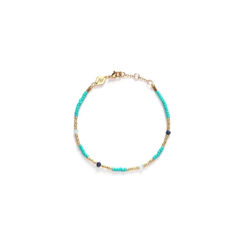 gold mesh bangle bracelet Clemence Gold Plated Bracelet w. Aqua Sky Beads