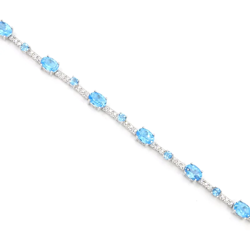 large statement turquoise ring Oval and Round Blue Topaz and Diamond Bracelet, 14K White Gold