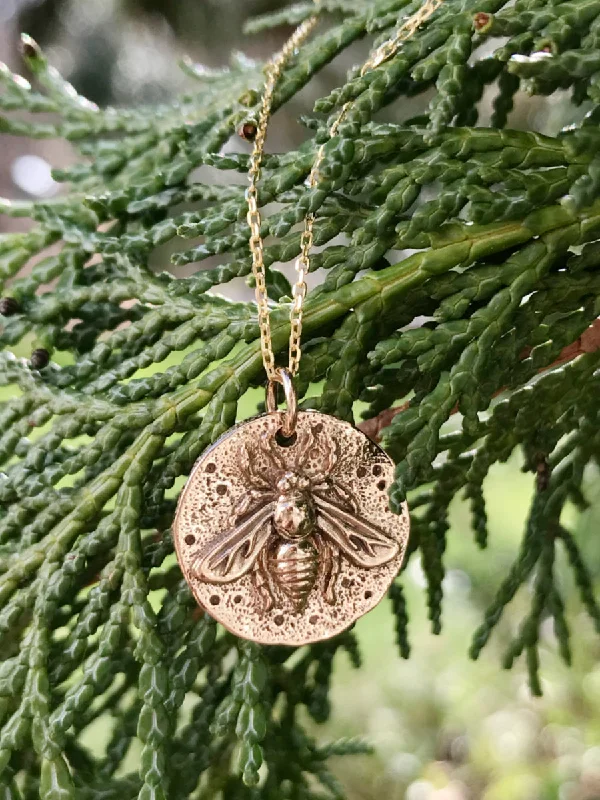 minimalist cubic zirconia earrings Bronze Bee Medallion Necklace