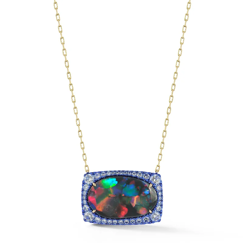 sleek black titanium ring The Cosmos Opal Pendant