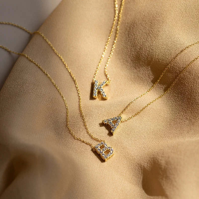 gold heart-shaped pendant necklace Floating Pave Initial Necklace