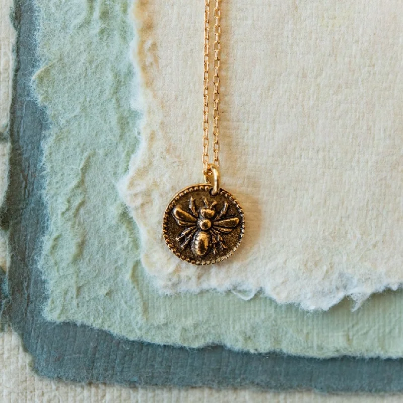 stackable gold bangle set Tiny Token Bee Necklace